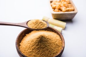 [freepicdownloader.com]-organic-gur-jaggery-powder-is-unrefined-sugar-obtained-from-concentrated-sugarcane-juice-medium